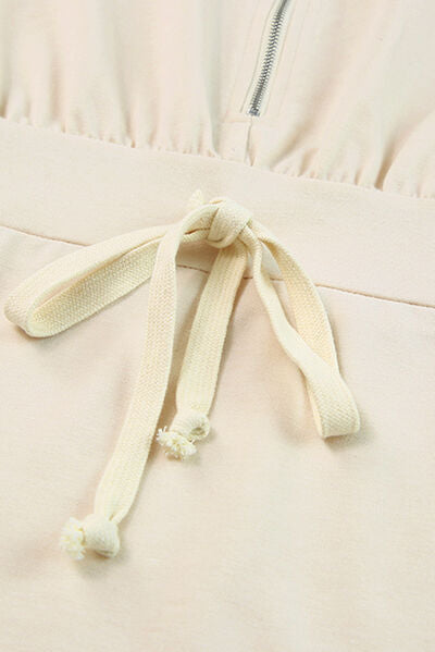 Robe à capuche mi-zippée
